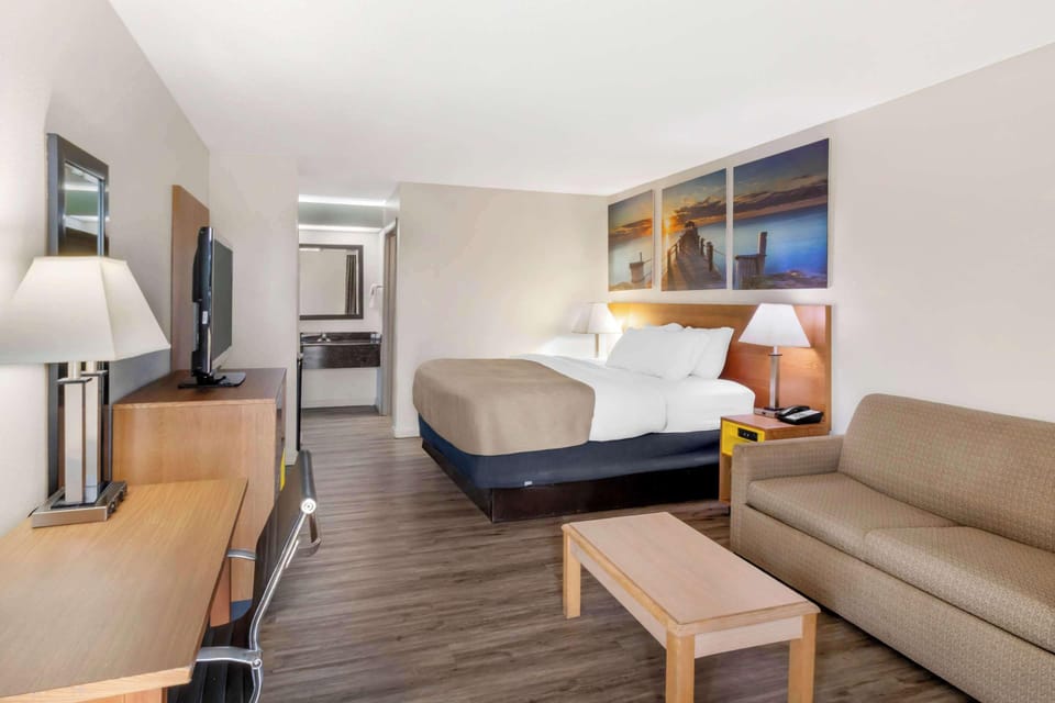 Suite, 1 King Bed, Non Smoking (Efficiency) | Laptop workspace, blackout drapes, iron/ironing board, free WiFi