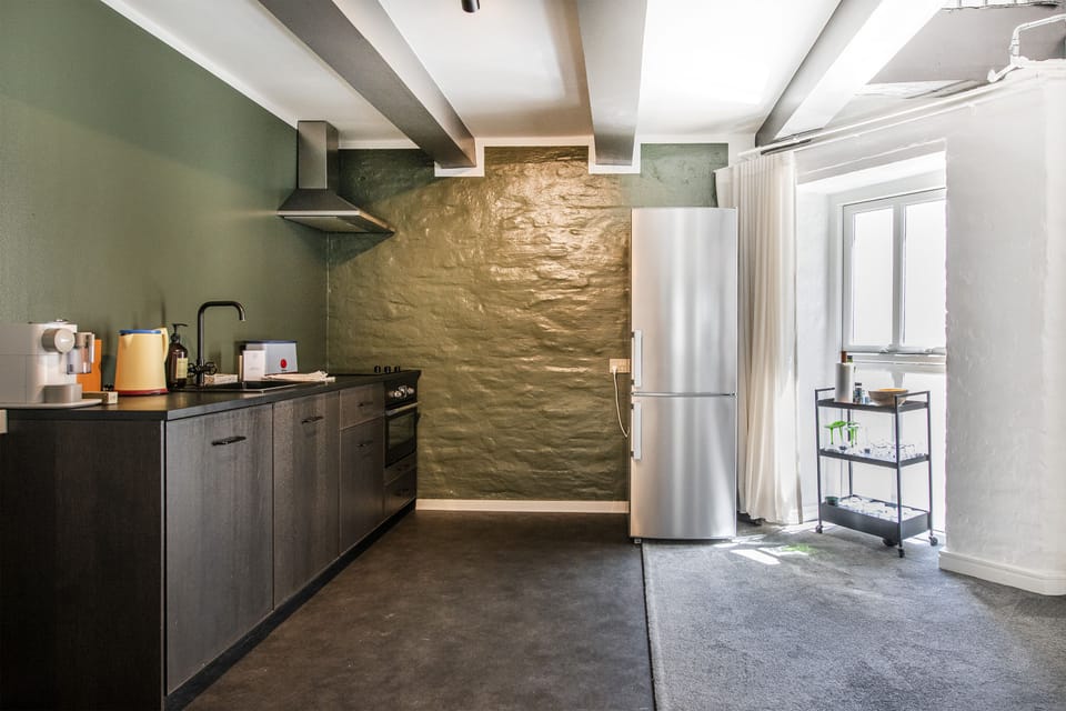 Exclusive Apartment | Private kitchen | Full-size fridge, microwave, oven, stovetop