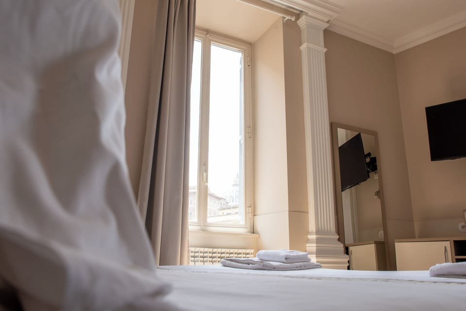 Superior Double or Twin Room, City View | In-room safe, desk, laptop workspace, blackout drapes