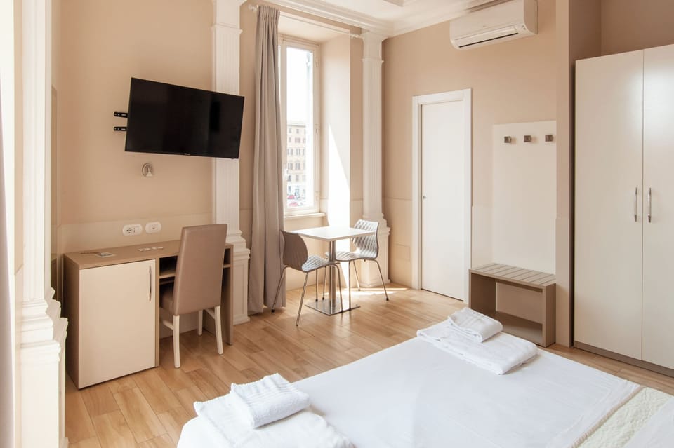 Superior Double or Twin Room, City View | In-room safe, desk, laptop workspace, blackout drapes
