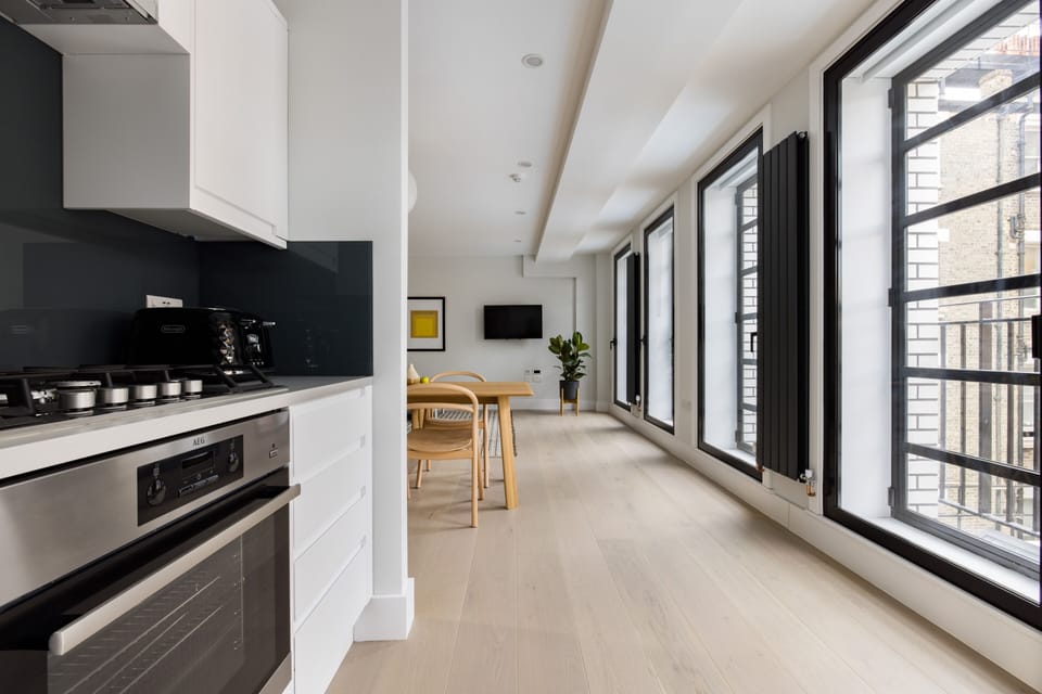 Luxury Suite, 2 Bedrooms | Private kitchen | Full-size fridge, microwave, oven, stovetop