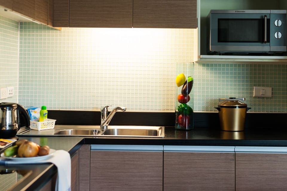 Premier Room, Balcony | Private kitchenette | Full-size fridge, microwave, electric kettle, cookware/dishes/utensils