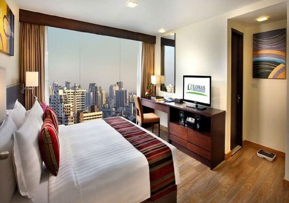 Down comforters, pillowtop beds, in-room safe, desk