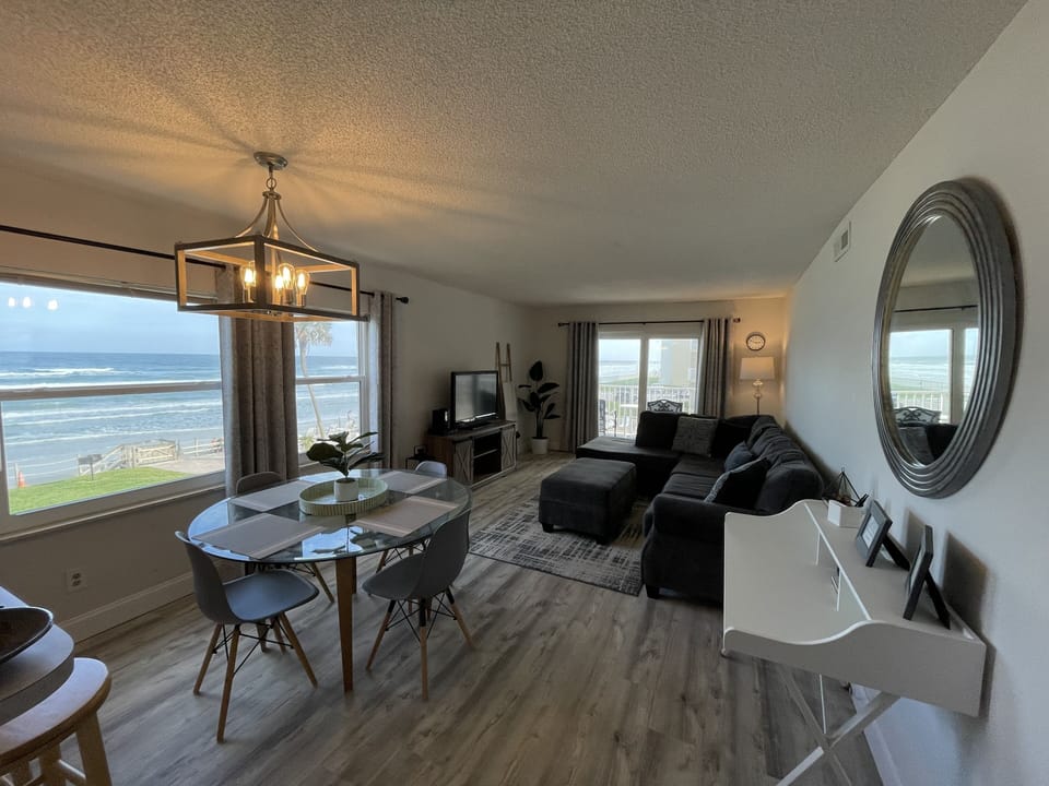 Exclusive corner unit with ocean views from the dining room table. 