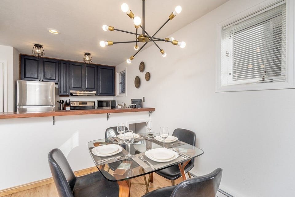 The dining area provides seating for 4 and a lovely place to enjoy your morning coffee and the paper before heading out on your day's adventure.