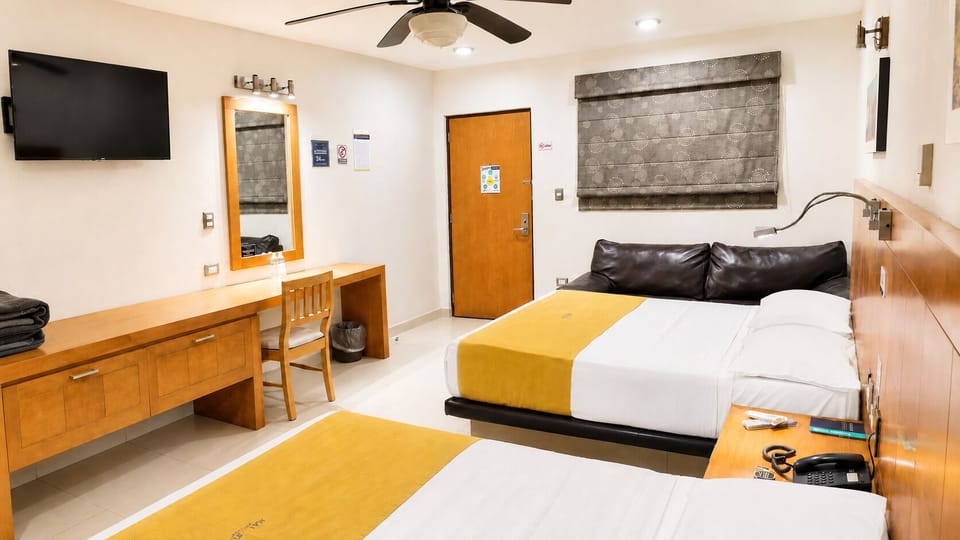 Deluxe Double Room, Multiple Bedrooms | Blackout drapes, soundproofing, free WiFi, bed sheets
