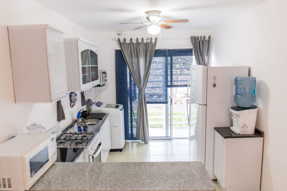 Kitchen include, washing machine.