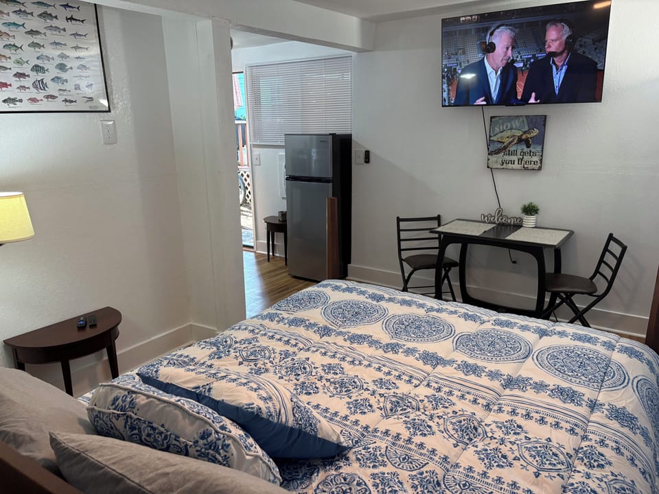 Mounted 50 inch tv. Dining/sitting table