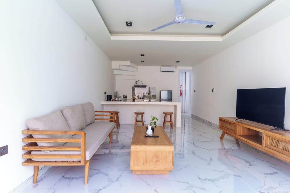 Suite, Private Pool (Detached Building from the Hotel) | Living area | 42-inch LED TV with cable channels, TV