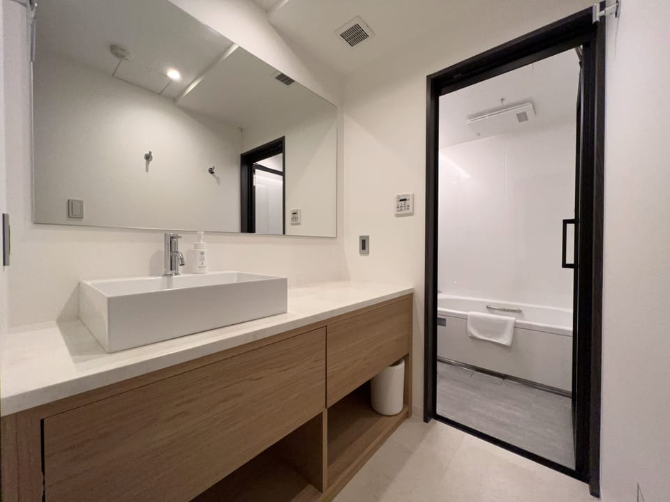 Separate tub and shower, deep soaking tub, free toiletries, hair dryer