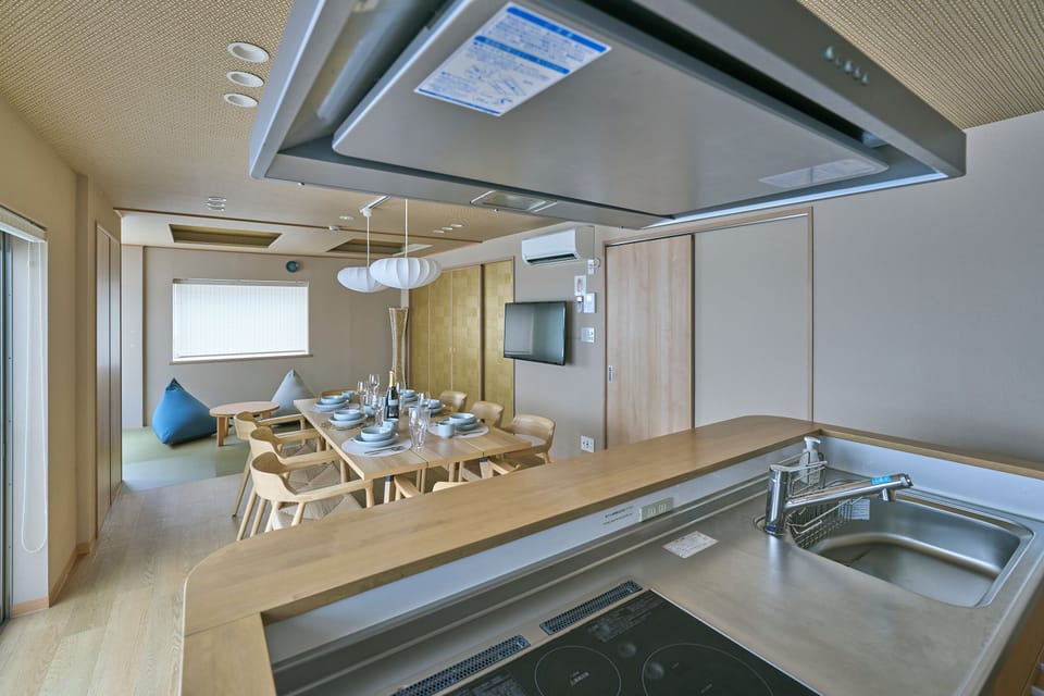 Family Suite | Private kitchen | Fridge, microwave, stovetop, electric kettle