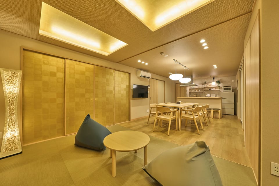 Family Suite | Living area | Flat-screen TV, first-run movies