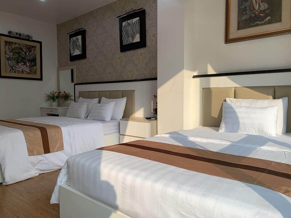 Family Room | Minibar, desk, blackout drapes, free WiFi