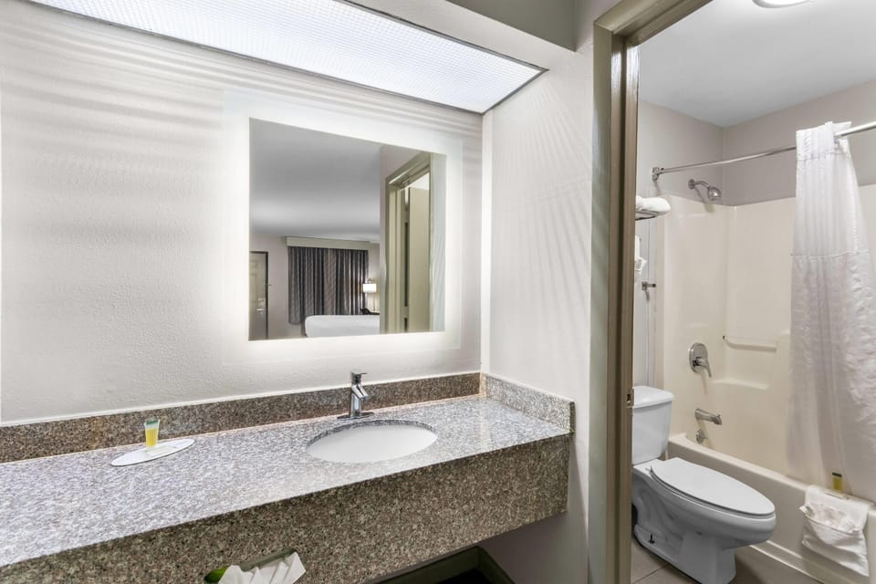 Room, 2 Queen Beds, Non Smoking | Bathroom | Free toiletries, towels
