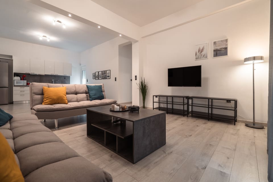 Standard Apartment | Living area | 43-inch flat-screen TV with cable channels, TV