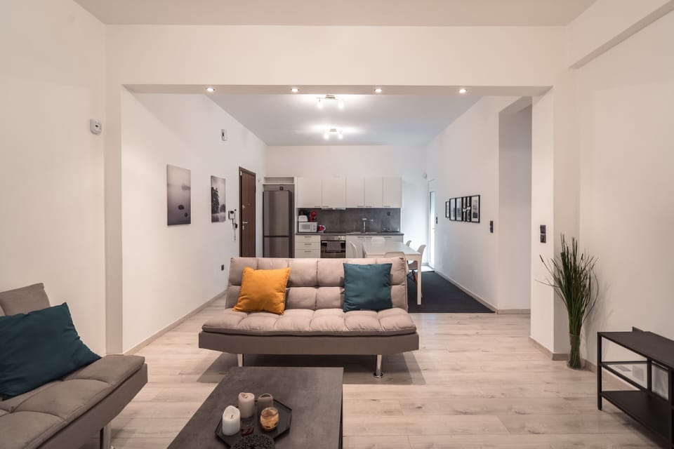 Standard Apartment | Living area | 43-inch flat-screen TV with cable channels, TV