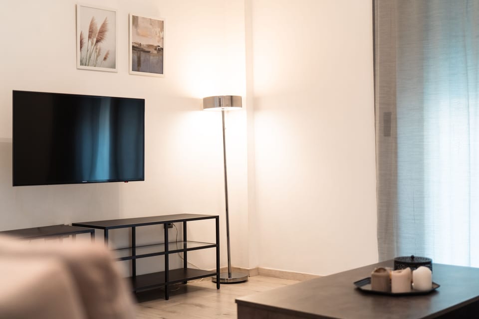 Standard Apartment | Living area | 43-inch flat-screen TV with cable channels, TV