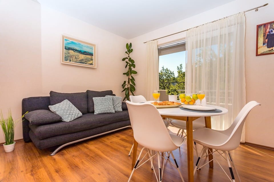 Kitchen and living area in AP1 with balcony
