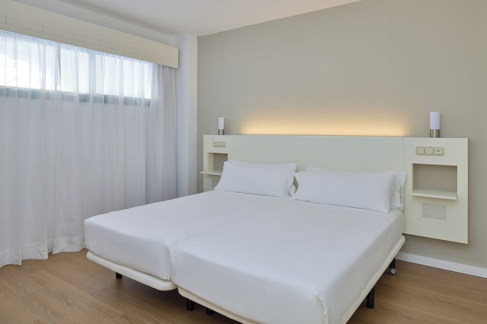 Desk, blackout drapes, free cribs/infant beds, free WiFi