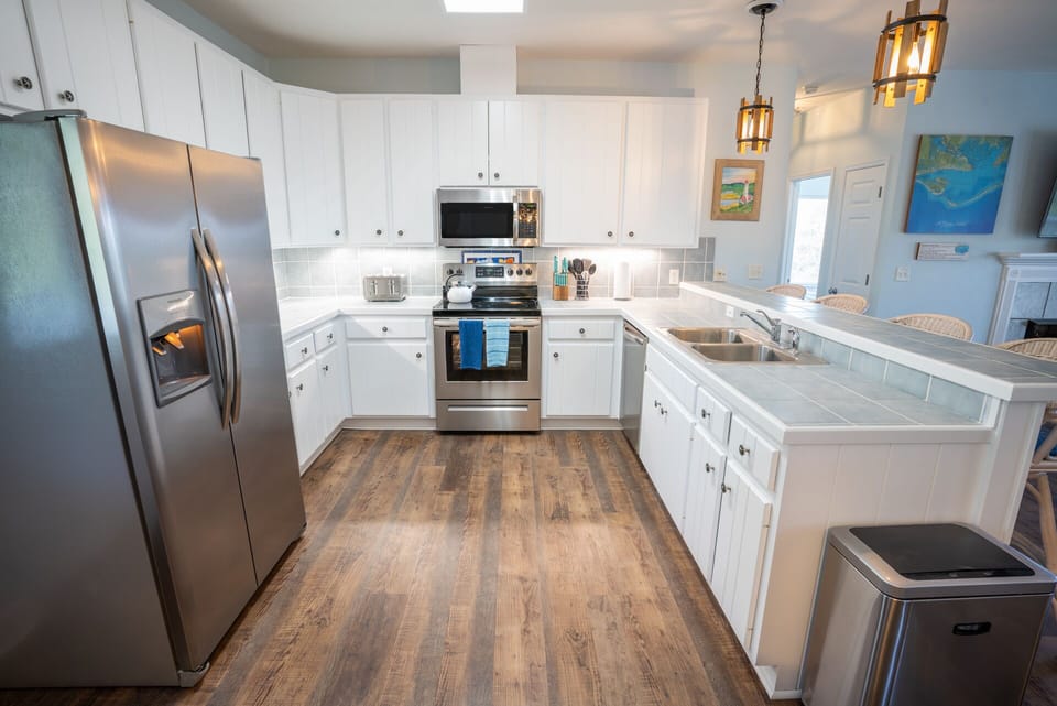 Bright and spacious kitchen with stainless appliances