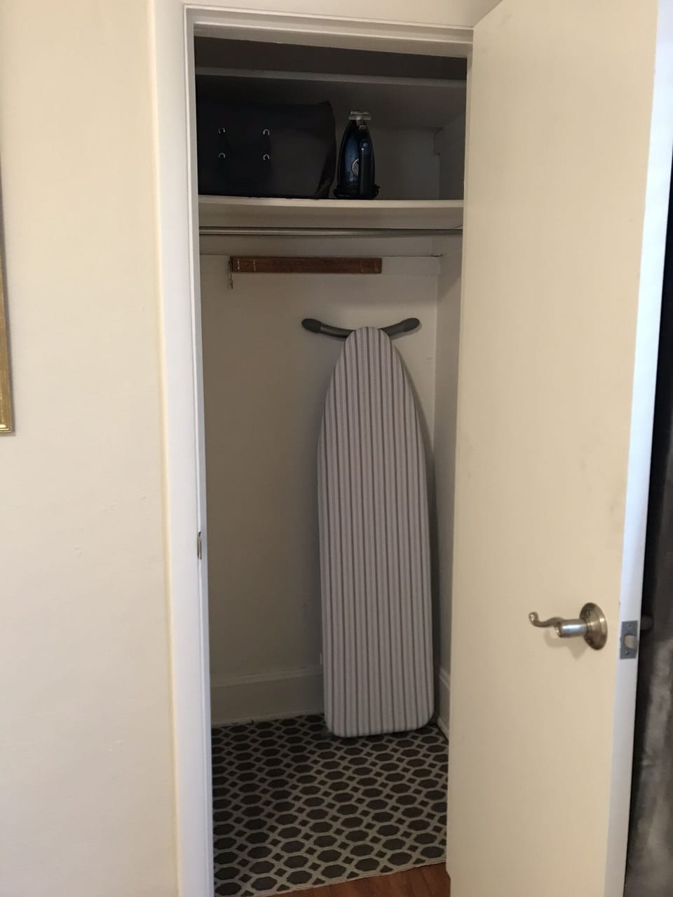 Iron, ironing board and cleaning supplies included