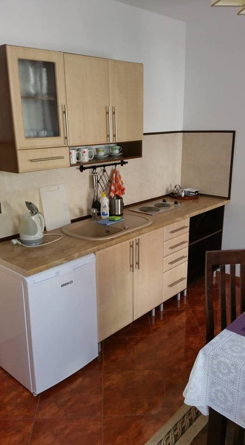 Apartment | Private kitchen | Fridge, stovetop, electric kettle, highchair
