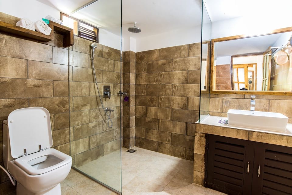 Shower, free toiletries, towels, soap