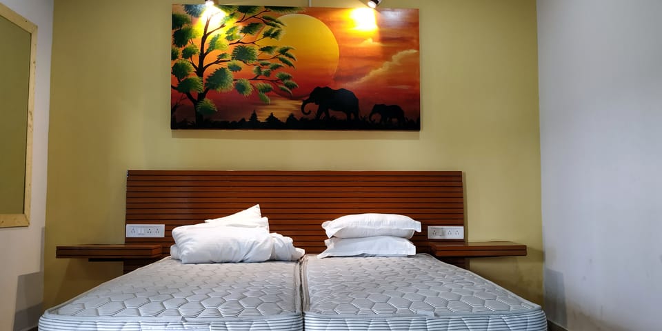 Deluxe Room, Lake View (AC) | Memory foam beds, minibar, individually decorated