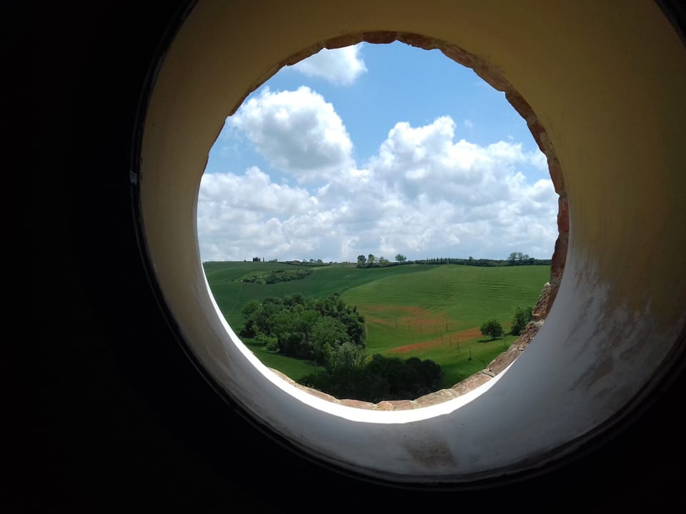 Round window in the single bedroom