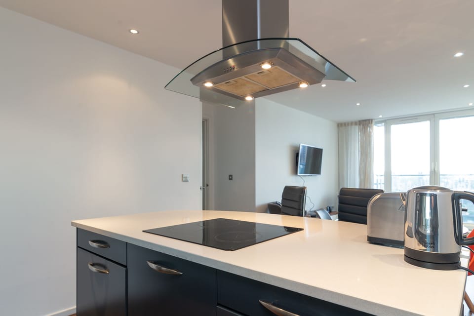 Two- Bedroom Apartment | Private kitchen | Fridge