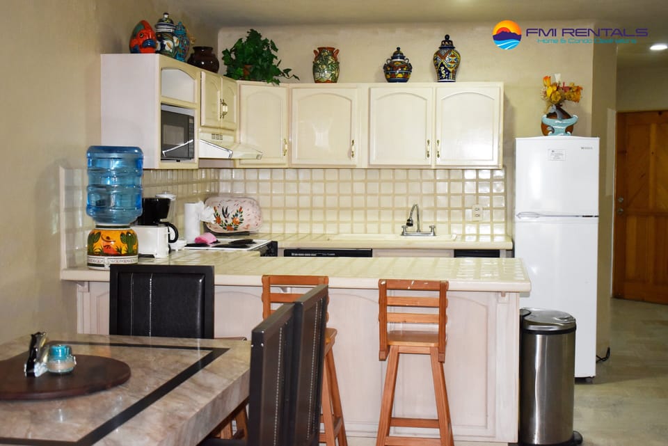 Kitchen with bar stools