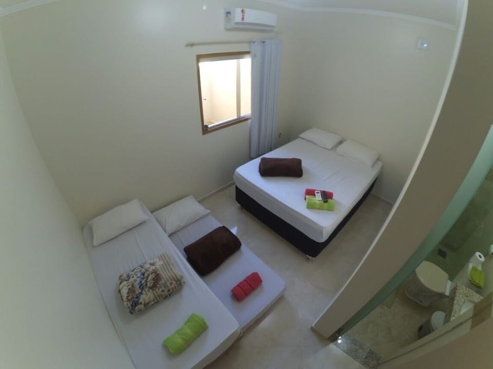Basic Quadruple Room, Multiple Beds | Minibar, iron/ironing board, free WiFi, bed sheets