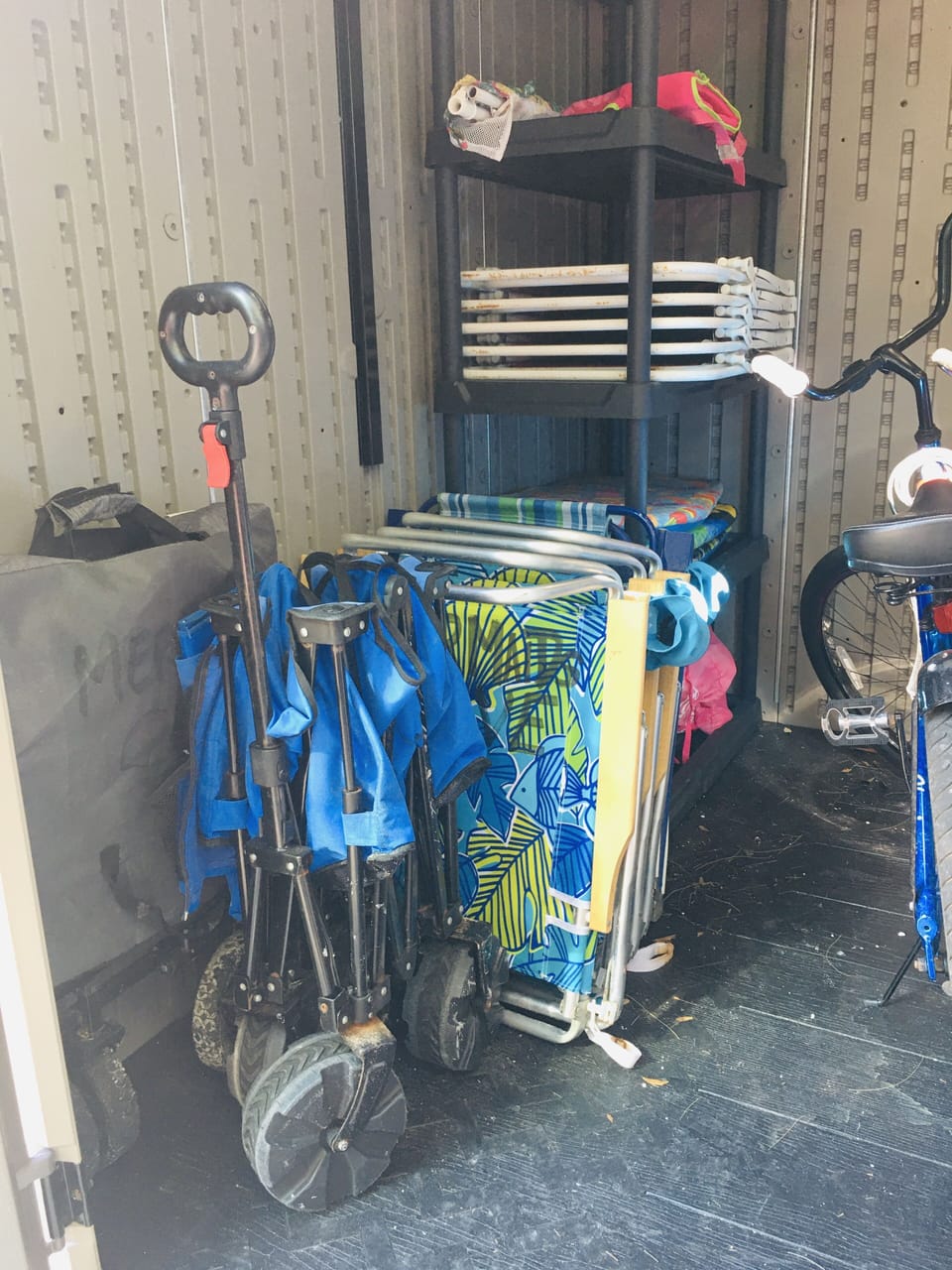 Beach chairs, umbrellas, ice chests, and a beach wagon to haul it all!  