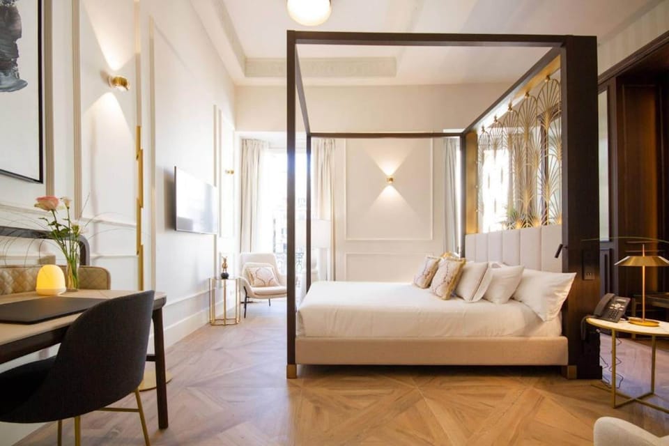 Deluxe Double Room | Minibar (free items), in-room safe, desk, blackout drapes
