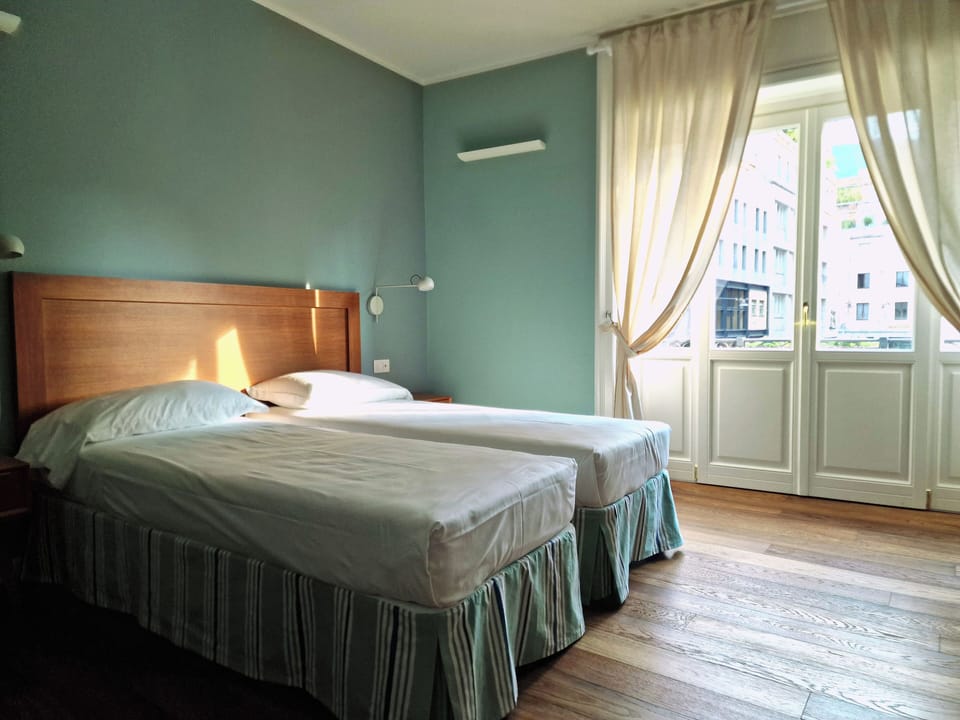 Deluxe Double or Twin Room | Desk, iron/ironing board, travel crib, free WiFi