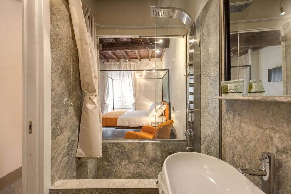 Shower, free toiletries, hair dryer, slippers