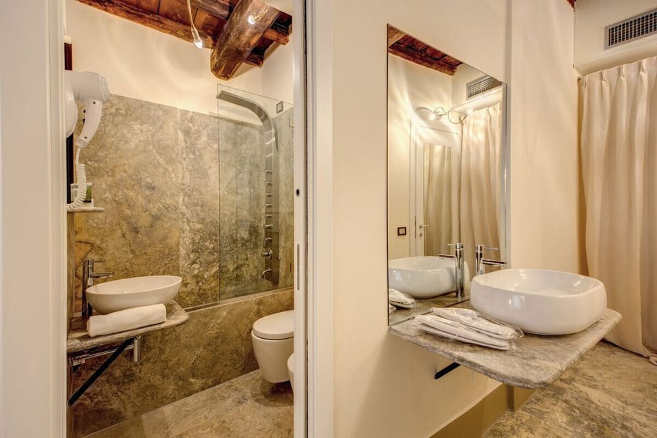 Shower, free toiletries, hair dryer, bidet