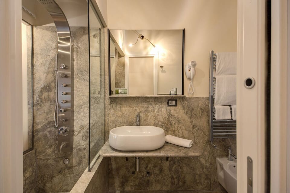 Shower, free toiletries, hair dryer, bidet