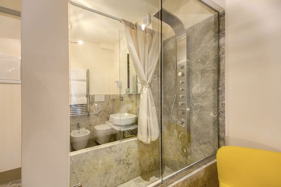 Shower, free toiletries, hair dryer, bidet