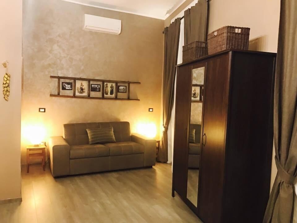 Quadruple Room | Living area | Smart TV