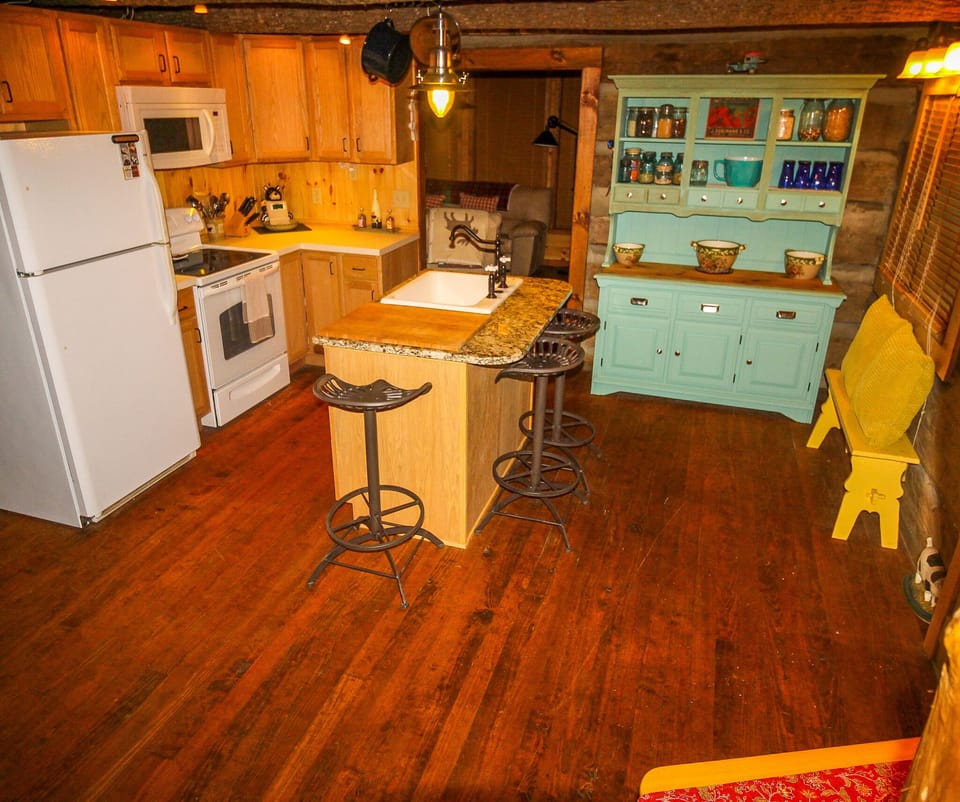 Tractor seats around the kitchen island.