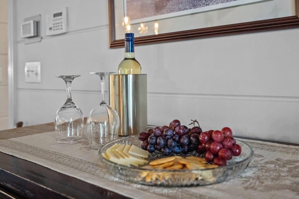 Dining room buffet perfect location for a wine and cheese board.