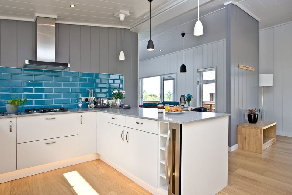 Modern kitchen with built-in single electric oven, warming tray and a gas hob - Batcombe Hollow, Strawberryfield Park