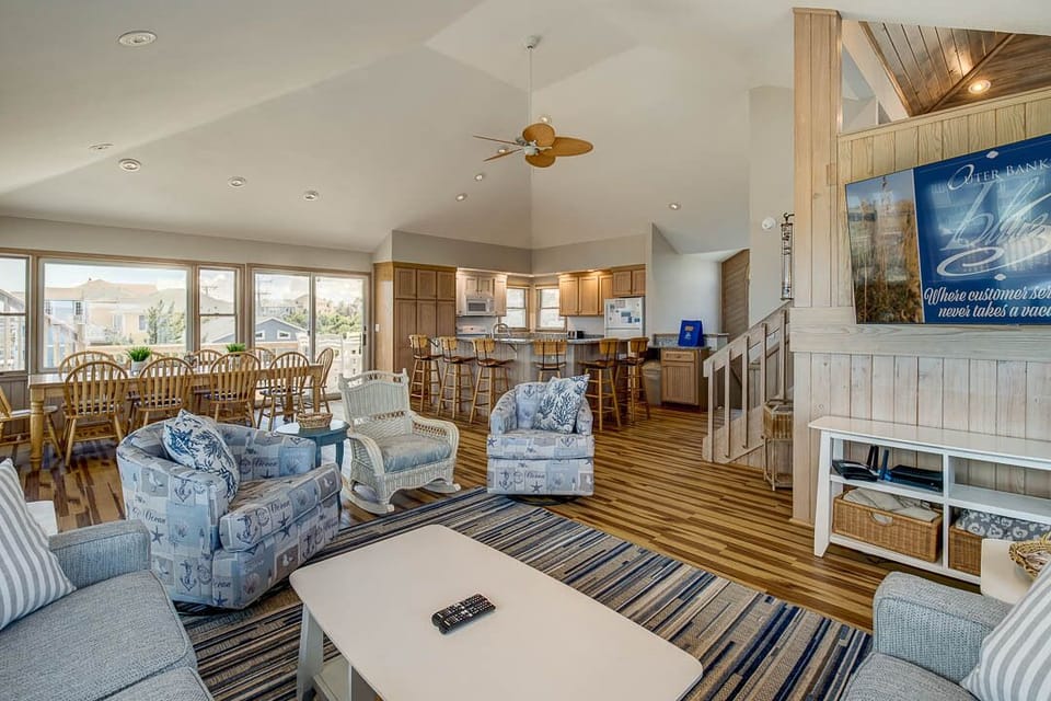 Top-Level Great Room with Deck Access leading to Rooftop Deck