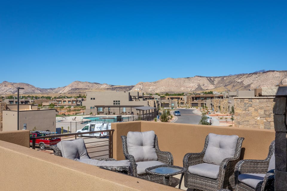 Patio View - The views from the Front Patio are breathtaking and overlook the majestic red rock formations of Snow Canyon State Park.