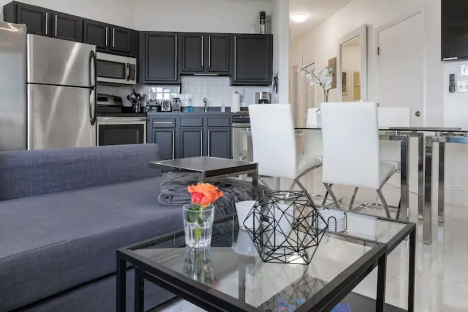 Experience the perfect fusion of entertainment and dining in the living room, designed to provide a seamless space for social gatherings.
