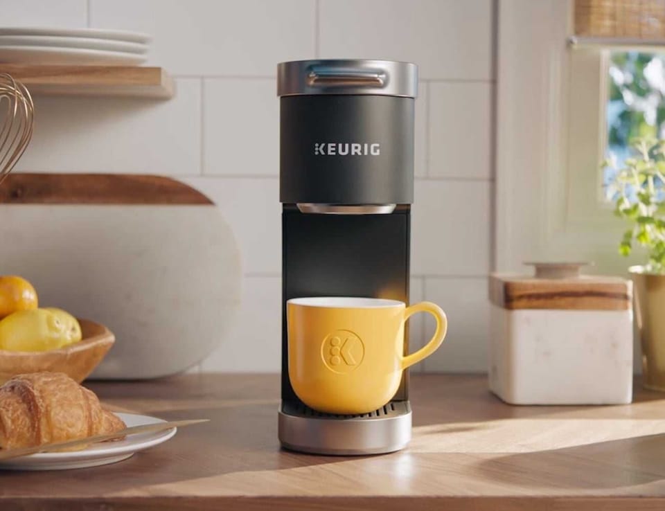 Brewing Bliss: Elevate your mornings with the Keurig Coffee Maker, your partner in crafting the perfect cup of joy