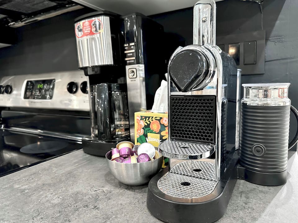 Enjoy the convenience of a Nespresso and Keurig Coffee Makeras well as milk frother, providing a variety of coffee options to start your day right.
