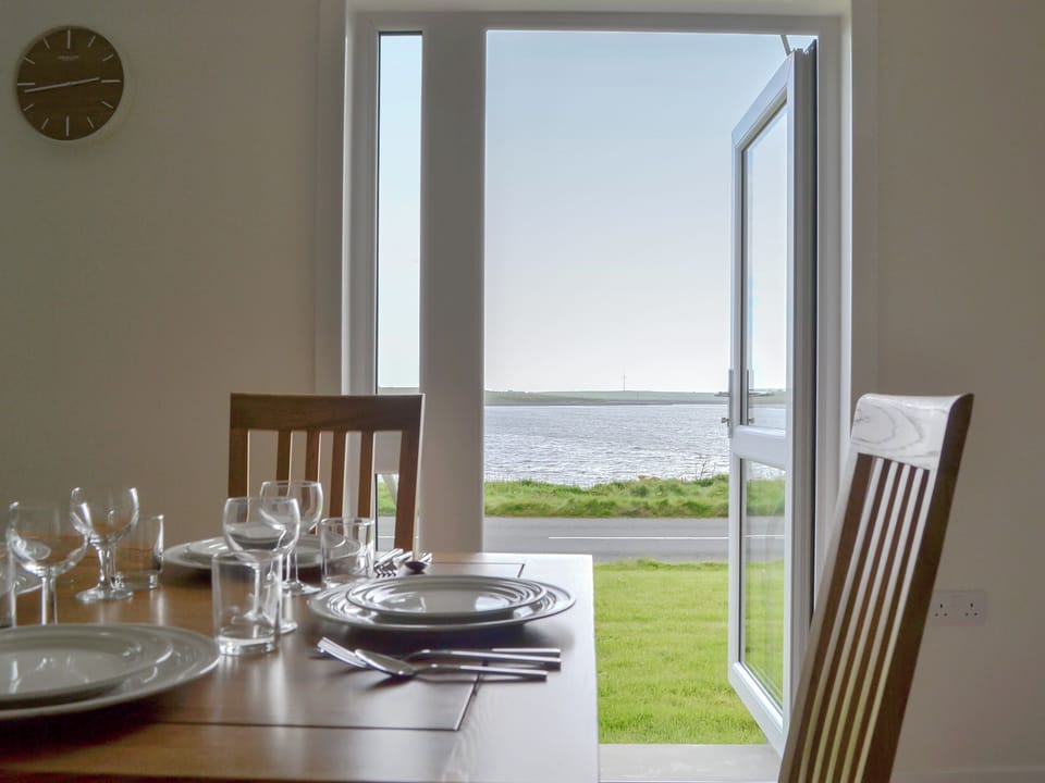 Dining area with lovely views | Rockworks Chalets No. 4 - Rockworks Chalets, Holm, near Kirkwall