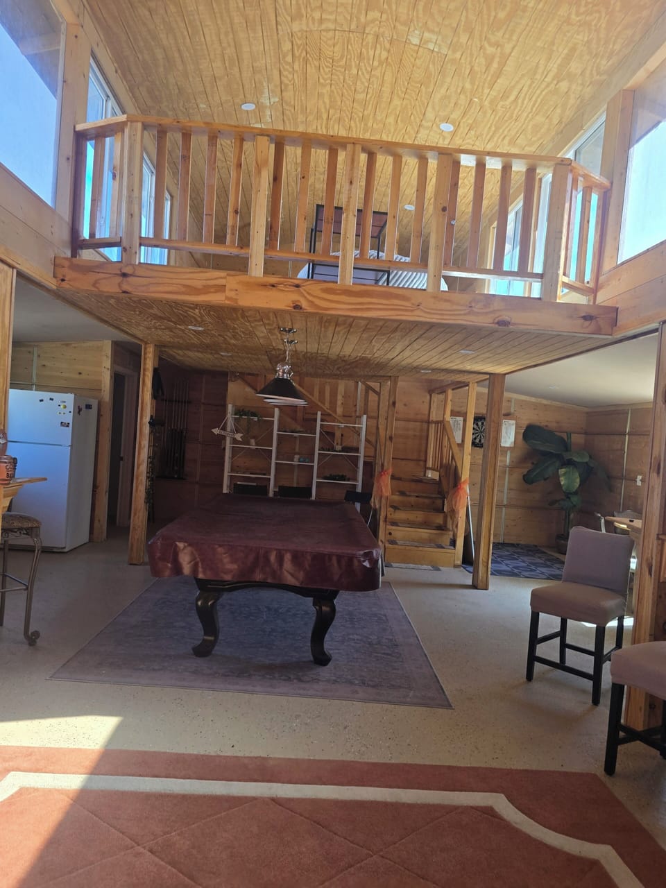 activity barn with pool table, TV,  darts, karaoke,  bathroom, sink, loft area.
perfect for a game night or party.